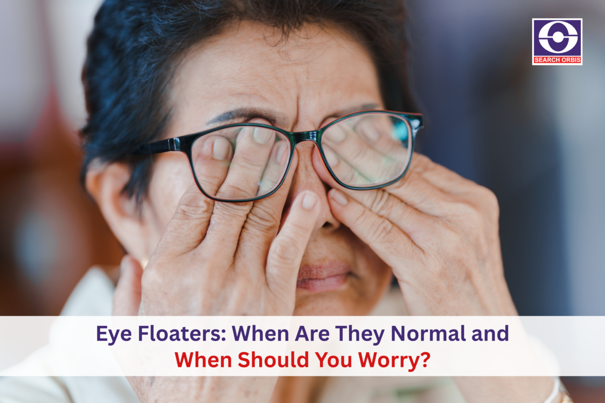 Person rubbing eyes due to eye floaters or blurry vision while wearing glasses.