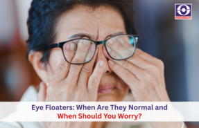 Person rubbing eyes due to eye floaters or blurry vision while wearing glasses.