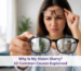 Person holding a pair of eyeglasses with clear lenses while experiencing blurry vision without them, illustrating common causes of blurred eyesight and the importance of eye care.